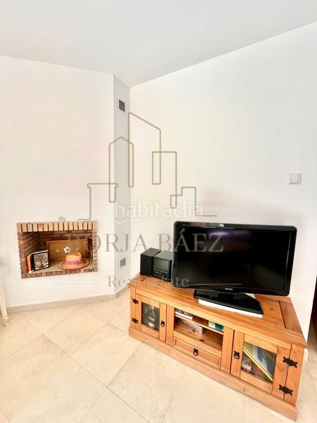 Foto f3555939-ffdd-4c1e-aebc-5b3a4dcea47d. Casa adossada amb aparcament a Benajarafe