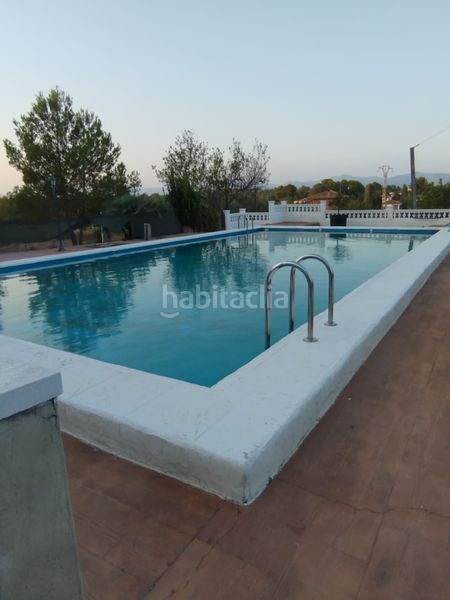 Foto 9179a6f7-0496-4c02-8495-a5f7f63131e8. Casa amb calefacció piscina a Parque de la Bombilla Llíria