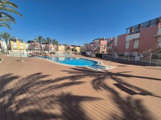 Planta baixa  Juan sebastian elcano(ma). Bajo de 3 habitaciones con terraza, piscina y garaje en vera.