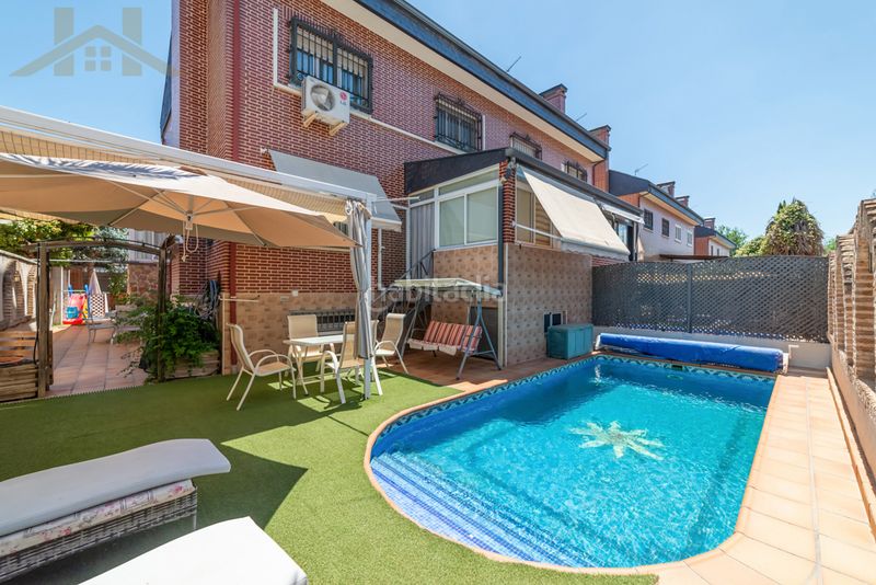 Foto 369c2b91-85c1-4bab-8414-4c47eca40fca. Casa aparellada amb xemeneia calefacció aparcament piscina a Rivas - Vaciamadrid