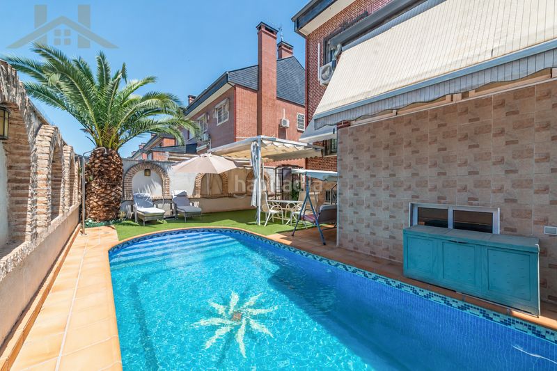 Foto 57bd6db4-9445-4056-a51e-5cc8edb0695e. Casa aparellada amb xemeneia calefacció aparcament piscina a Rivas - Vaciamadrid