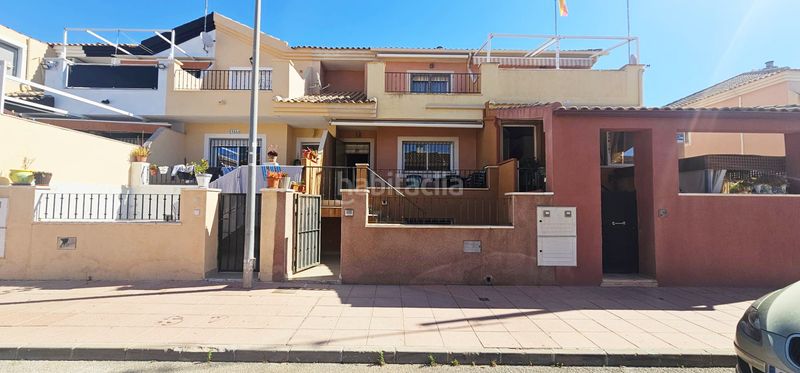 Foto 5e21bbc3-9c74-40f9-8506-21772d83468a. Casa adossada amb calefacció aparcament piscina a San Javier