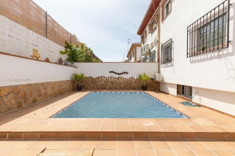 Foto d8ad39c6-005f-43bb-9c97-5d4f7935ad0c. Casa aparellada amb calefacció aparcament piscina a Gójar