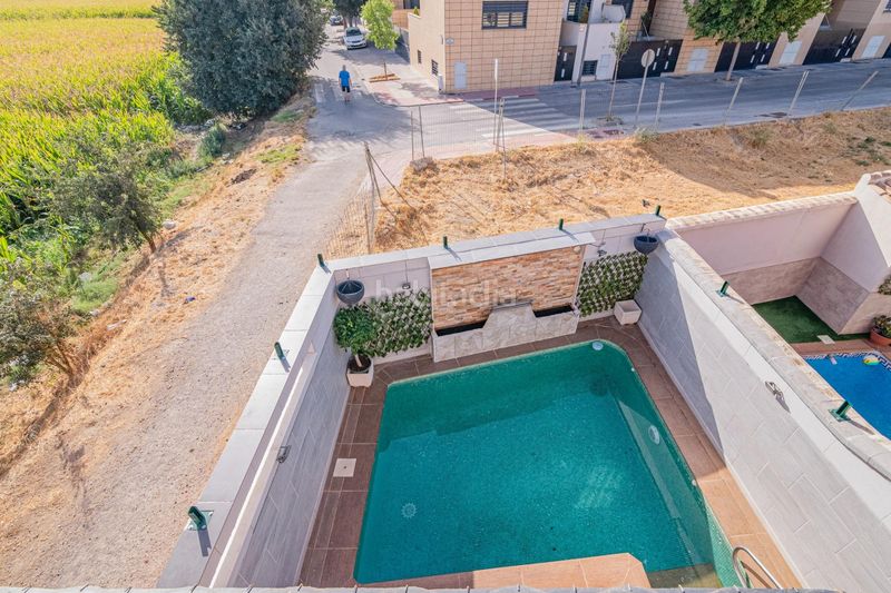 Foto 0b9e4821-e9d7-492e-b1c0-e95f796d9039. Casa aparellada amb calefacció aparcament piscina a Armilla