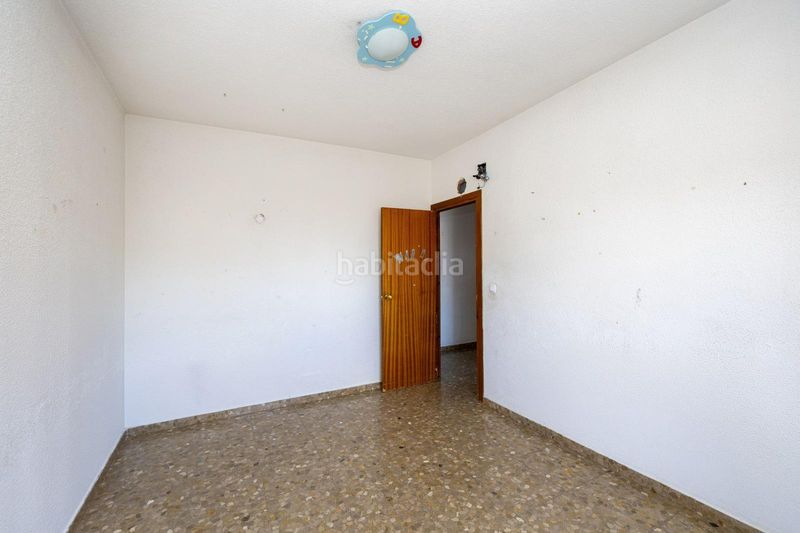 Foto ae101811-3e73-491b-a54c-0bfb59c0f507. Casa adossada amb aparcament a La Zubia Ciudad Zubia (La)