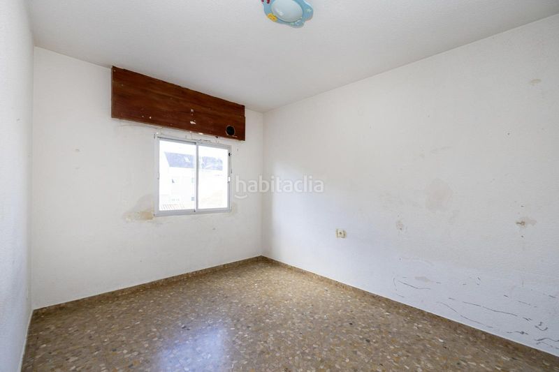 Foto c922ee4b-f966-422a-b9a3-e00d0b6a93ac. Casa adossada amb aparcament a La Zubia Ciudad Zubia (La)