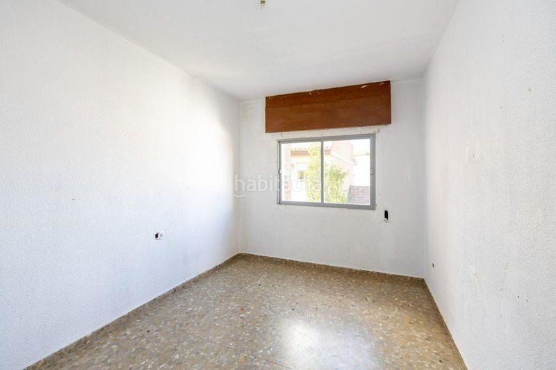 Foto ce1c15b0-bcf2-437a-a40d-e8dd81227107. Casa adossada amb aparcament a La Zubia Ciudad Zubia (La)