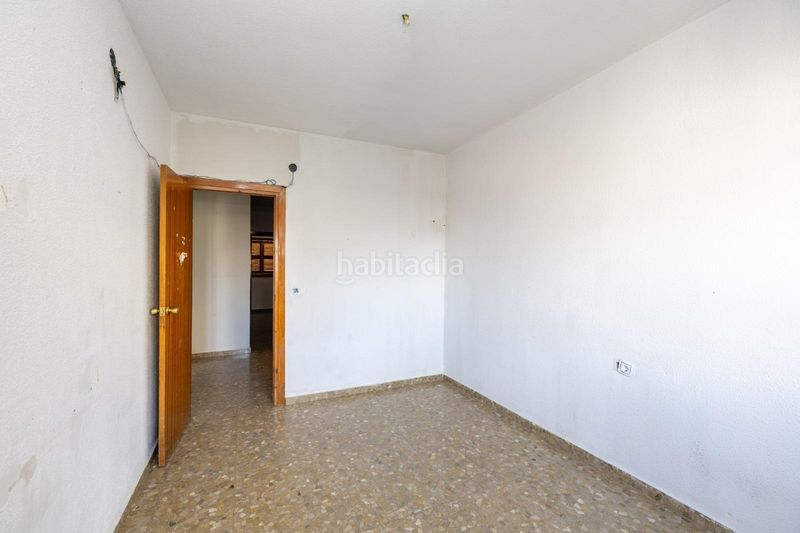 Foto dbbc5d31-4507-4faa-851c-46c00bc68b63. Casa adossada amb aparcament a La Zubia Ciudad Zubia (La)