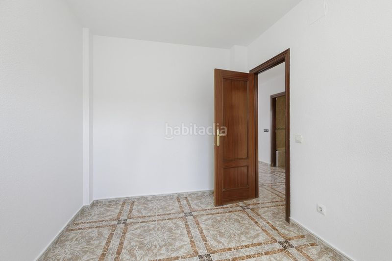 Foto 538146cf-2f97-4f41-9b90-c7c1325602d0. Casa adossada amb aparcament a Ogíjares