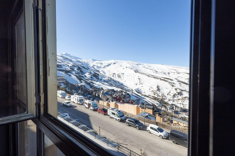Foto 18d1c7d7-38e0-4058-abf1-a6dcffbfb105. Piccolo appartamento in urbanización sol y nieve 109 in Sierra Nevada