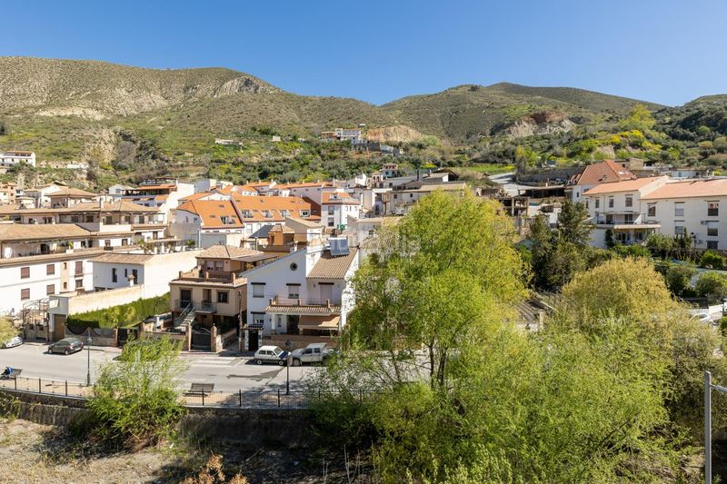 Foto 86e2f282-8613-4796-b0c1-1b86e65bcf68. Pis amb aparcament a Monachil pueblo Monachil