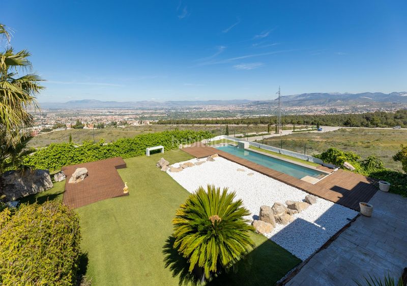 Foto 3b8990b7-4a91-47a1-8cf3-c3bb7632e90e. Xalet amb xemeneia calefacció aparcament piscina a Zubia (La)