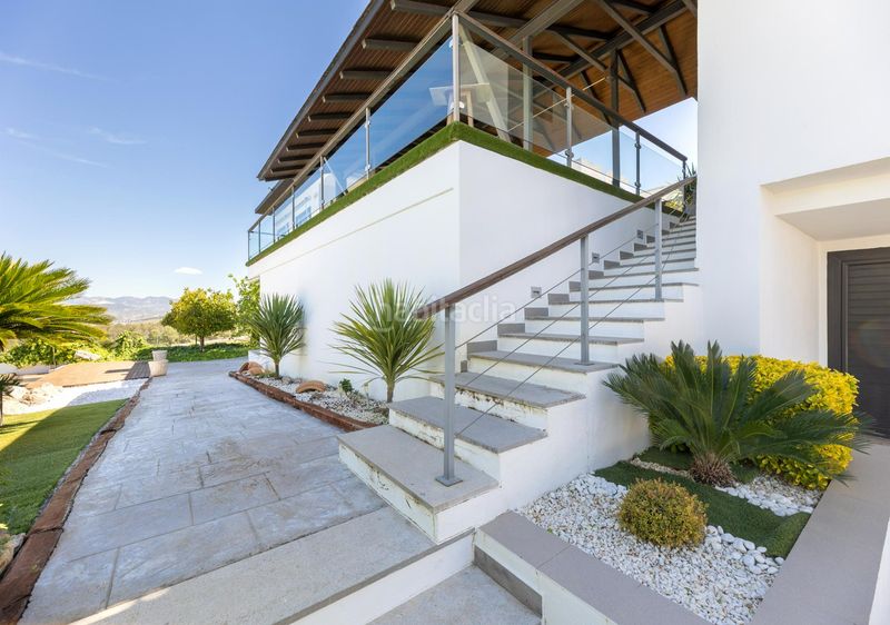 Foto 43a9ba75-1909-4d25-8e09-60c0d3a99327. Xalet amb xemeneia calefacció aparcament piscina a Zubia (La)