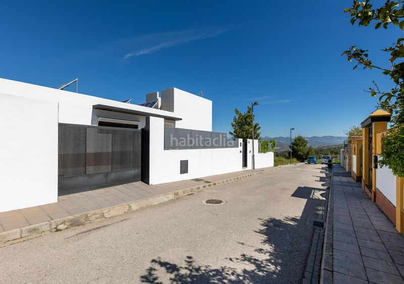 Foto ba7895d6-d954-44ea-9804-cf9ac9bce394. Xalet amb xemeneia calefacció aparcament piscina a Zubia (La)