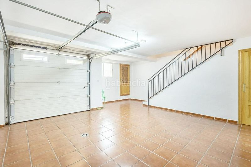 Foto 9ab9fd77-4802-4295-9b92-7990041e1674. Casa aparellada amb xemeneia aparcament a San Miguel Armilla