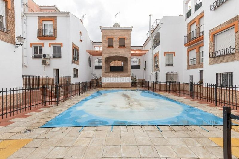 Foto 69f88a59-b309-44e5-93c5-1fb94ff0eee6. Casa adossada amb xemeneia aparcament piscina a Joaquina Eguaras Granada