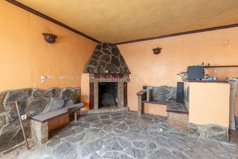 Foto d0f92524-a12d-46ef-a9d5-57905b15f19e. Casa adossada amb xemeneia aparcament piscina a Joaquina Eguaras Granada