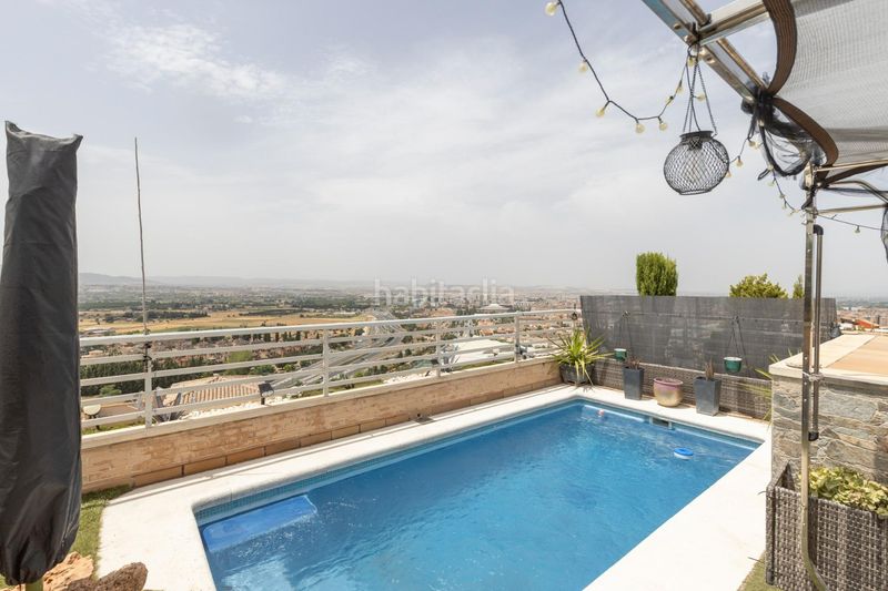 Foto c7a3aeb6-901d-46f1-8269-00cbd46497cd. Casa adossada amb calefacció aparcament piscina a Granada