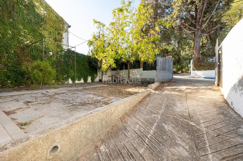 Foto f1f2a628-e0db-4912-9abc-a7984ce59179. Xalet amb xemeneia piscina a Dílar