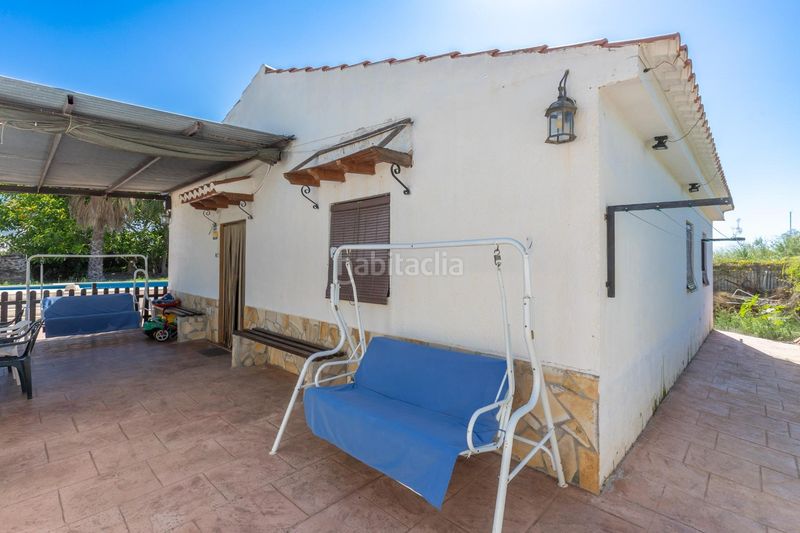 Foto f7ed373e-ea85-453a-81ae-5ceeb898f5a9. Masia amb xemeneia piscina a Playa de Granada Motril