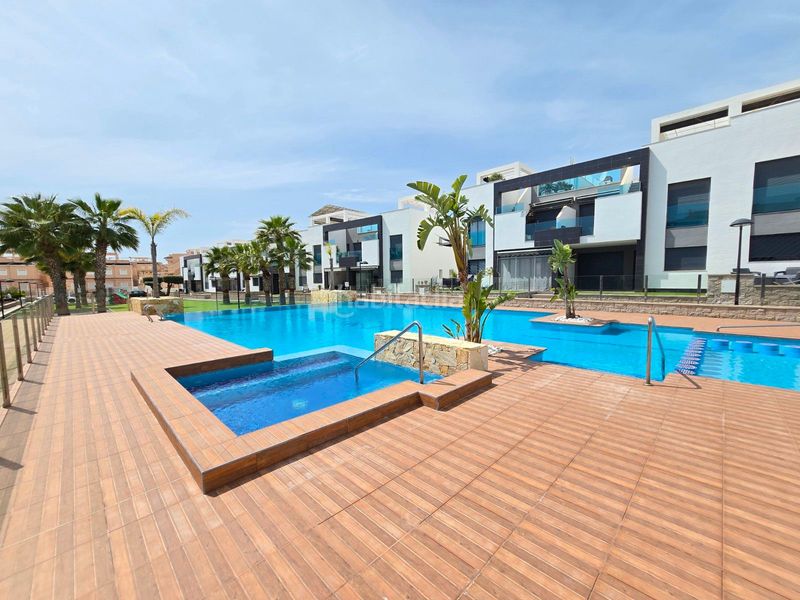 Foto 07c723aa-1eb7-4273-b475-be80564ff8e3. Apartament amb calefacció aparcament piscina a Punta Prima Orihuela