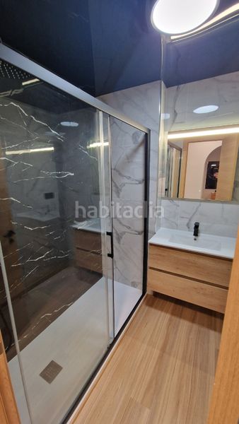 Foto 95f90310-0e49-4e84-82ad-00511e2c3647. Casa adossada amb piscina a Villamartín-Las Filipinas Orihuela