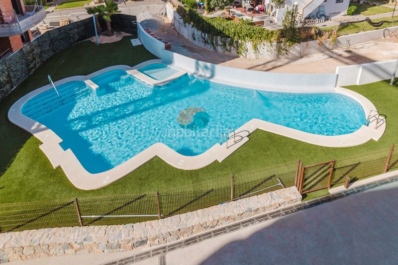 Foto b1afe031-0622-456e-9645-498b0739ee1a. Casa amb aparcament piscina a Playa Flamenca Orihuela
