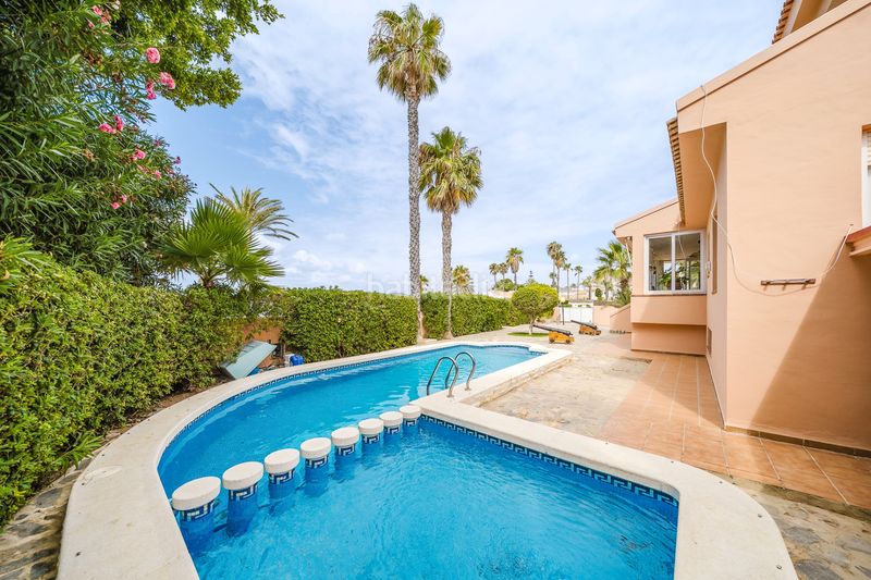 Foto 0bac2672-ff39-4a40-89aa-882068242b57. Casa amb calefacció aparcament piscina a Entremares Manga del Mar Menor (La)