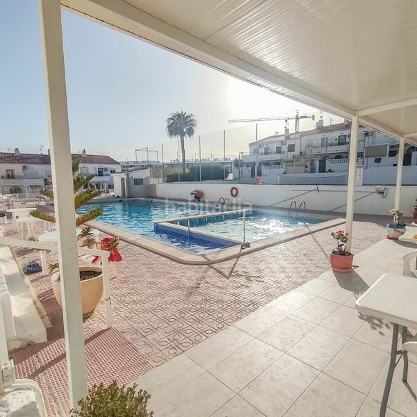 Foto 568c3664-a6e2-4eb9-88e2-d58c32589c6b. Casa adossada amb piscina a Torreblanca Torrevieja