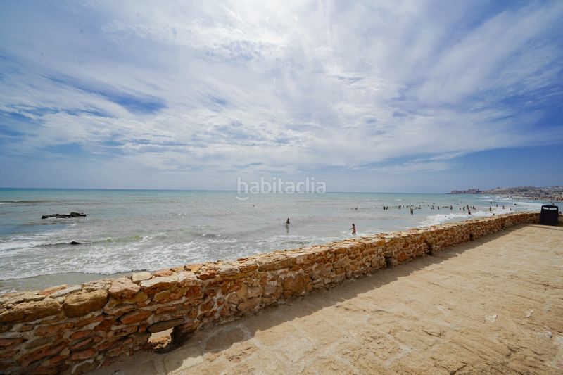Foto f8015935-ec04-4636-9217-b5570af66443. Casa adossada amb piscina a Torreblanca Torrevieja