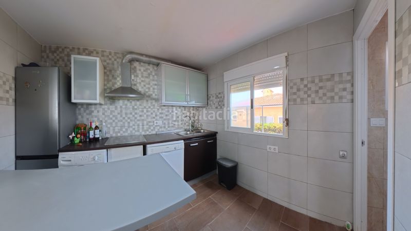 Foto 10771f38-ea2e-4835-9aad-776ec9a9c851. Casa aparellada amb xemeneia calefacció aparcament a Sueca