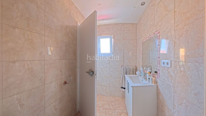 Foto 3d233f27-47fa-4205-b52c-597244c779ae. Casa aparellada amb xemeneia calefacció aparcament a Sueca