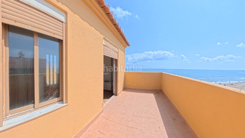 Foto 4261305e-ea71-4e6d-b90e-4f4530c0dee8. Casa aparellada amb xemeneia calefacció aparcament a Sueca