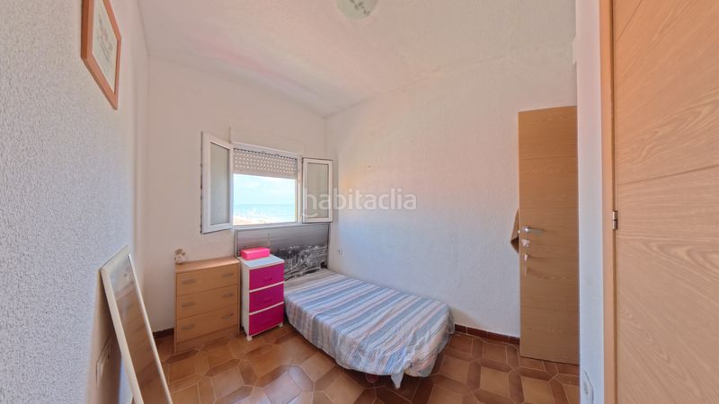 Foto 80410241-8e78-4dfe-87b3-8a48a5fe8ba0. Casa aparellada amb xemeneia calefacció aparcament a Sueca