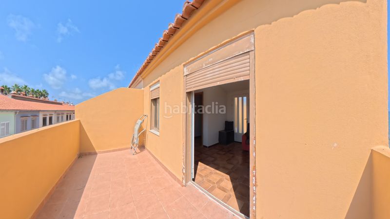 Foto 83468041-a8ae-43f8-b021-e2ffb064d2f6. Casa aparellada amb xemeneia calefacció aparcament a Sueca
