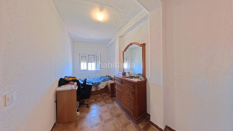 Foto 9431568f-6de5-471e-8d28-7714a990e852. Casa aparellada amb xemeneia calefacció aparcament a Sueca