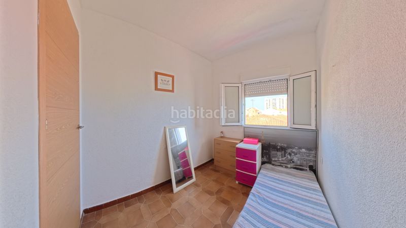 Foto 94d50ca1-3a2d-474a-861d-aedc11fb3656. Casa aparellada amb xemeneia calefacció aparcament a Sueca