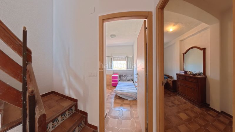 Foto acd5b277-5515-4d8b-9fec-e12099ce0916. Casa aparellada amb xemeneia calefacció aparcament a Sueca