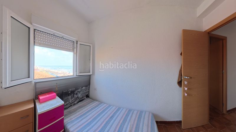 Foto e6038059-8327-48b9-a828-f56a7de311aa. Casa aparellada amb xemeneia calefacció aparcament a Sueca
