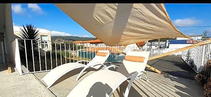 Foto b72ee71d-d579-4839-b0b3-6f6f3897a254. Casa amb calefacció aparcament piscina a san xoán de Poio Poio