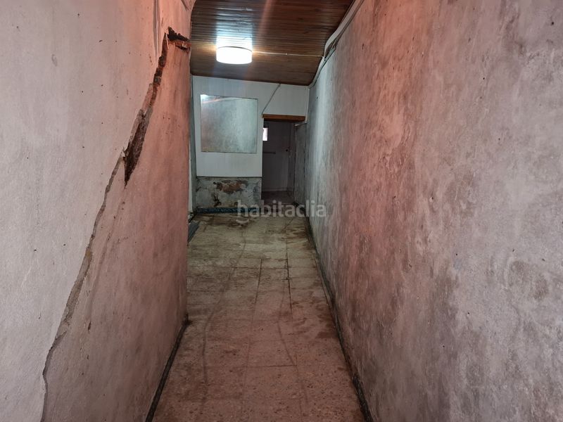 Foto e3d51d10-6c44-4cd0-9f05-ff916c43aea0. Casa adosada en calle luis trelles 17 casa a restaurar en Viveiro