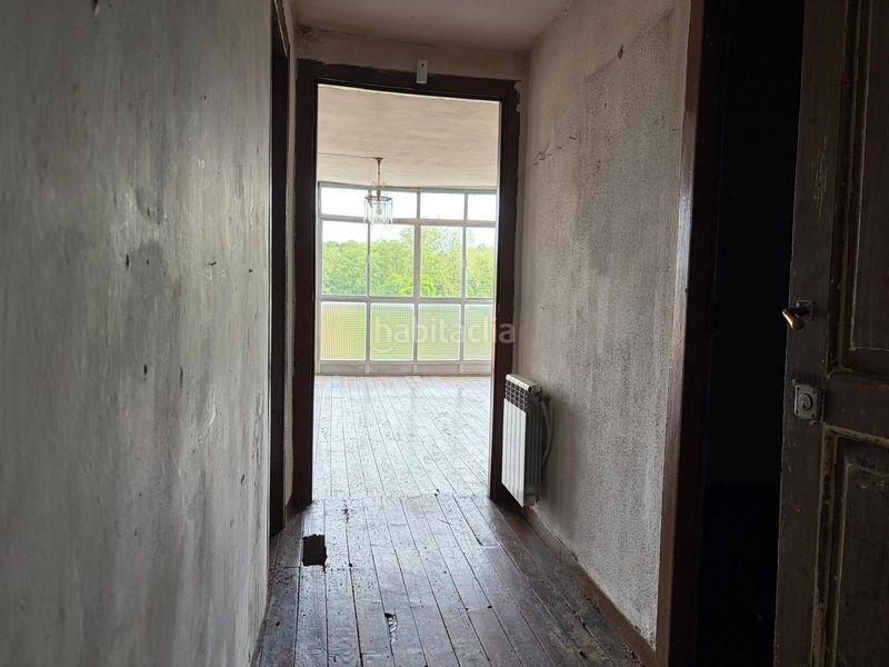 Foto dd035758-e964-424e-87fb-5fd20196d246. Casa adossada a Baños de Molgas