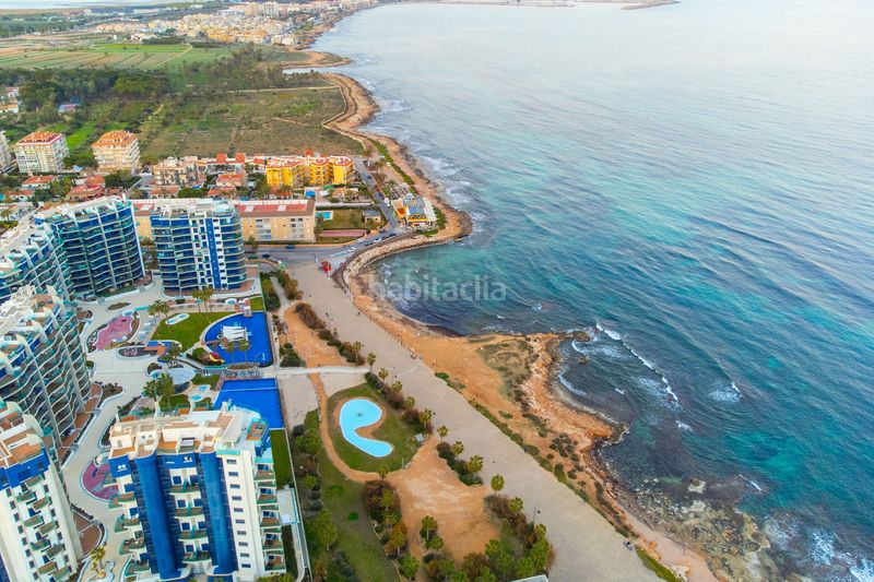 Foto d4e9c7fe-5a35-479d-ac7b-03a718cf2117. Apartament a Punta Prima Torrevieja