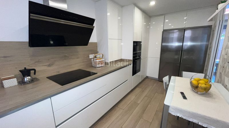 Foto ff1b9f1f-862a-42e9-b4d8-95b8088ed572. Casa adossada amb calefacció aparcament piscina a Málaga
