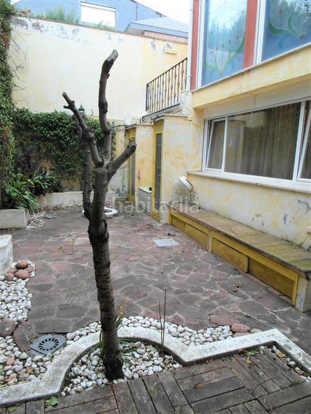 Foto 3ace1cbc-075e-4dc8-9b13-1557fd6dacd7. Casa aparellada amb xemeneia calefacció piscina a Madrid