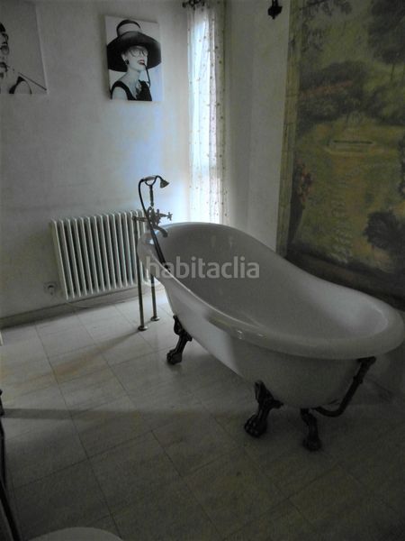 Foto 3ed26056-35cb-4615-a60e-56ceacb3a563. Casa aparellada amb xemeneia calefacció piscina a Madrid