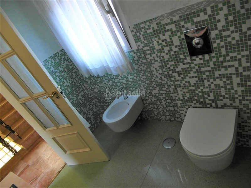 Foto 4e8e3fe6-4600-4612-8bdd-b79a9c1b95bc. Casa aparellada amb xemeneia calefacció piscina a Madrid