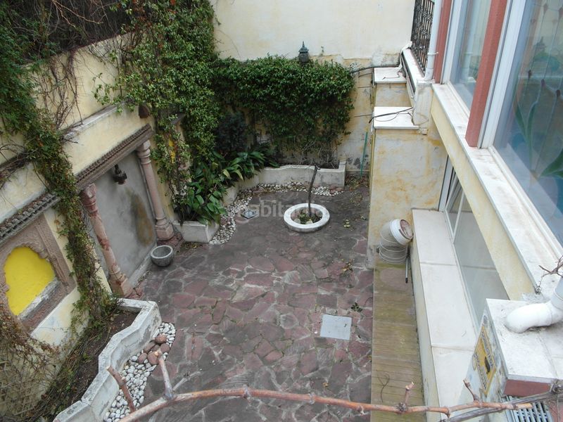Foto 689480d5-7261-498f-badc-078d2419f0ea. Casa aparellada amb xemeneia calefacció piscina a Madrid