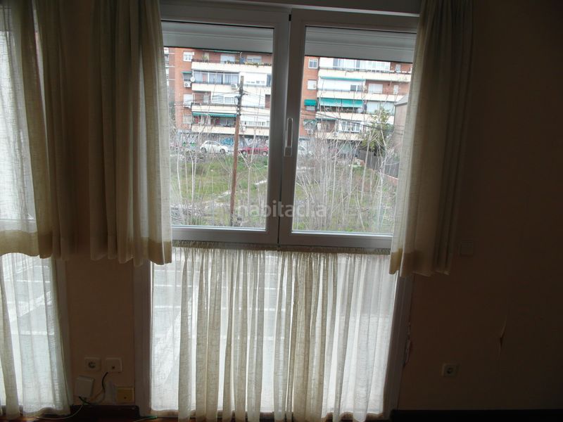 Foto 9b218b19-bc87-40a6-b71a-250c5becce63. Casa aparellada amb xemeneia calefacció piscina a Madrid