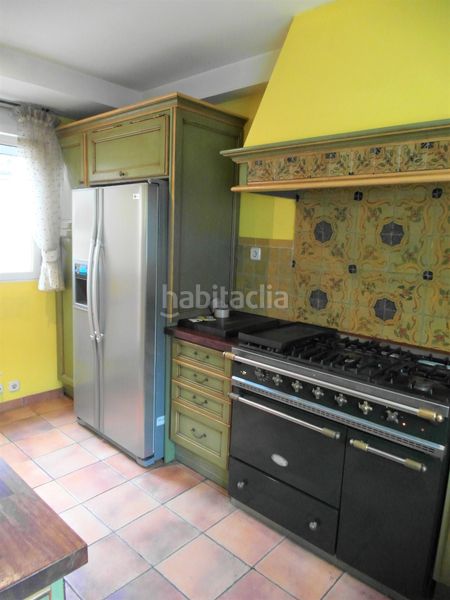 Foto e90ce350-6927-48cd-8a0c-1fa086d6d235. Casa aparellada amb xemeneia calefacció piscina a Madrid